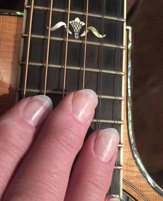 About Guitars & Fingernails